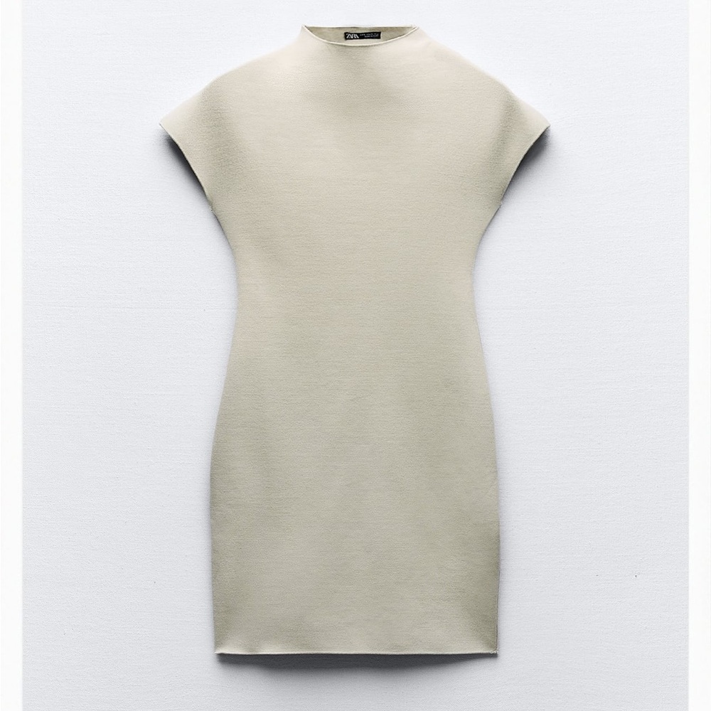 Zara New w Tags
Short fitted knit dress - medium - almond color